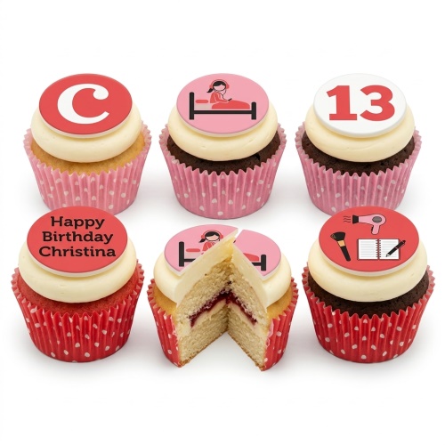Six cupcakes with white frosting and red/pink toppers featuring a letter C, a girl in bed, the number 13, "Happy Birthday Christina", and beauty/notebook icons, in red and pink polka dot wrappers.