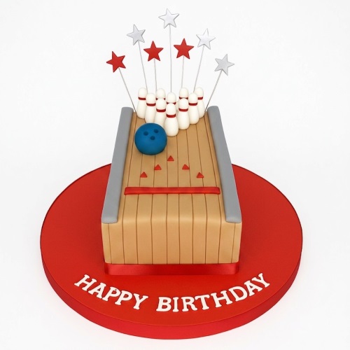 Rectangular bowling alley cake with pins, blue bowling ball, and star toppers on a red 'Happy Birthday' board.