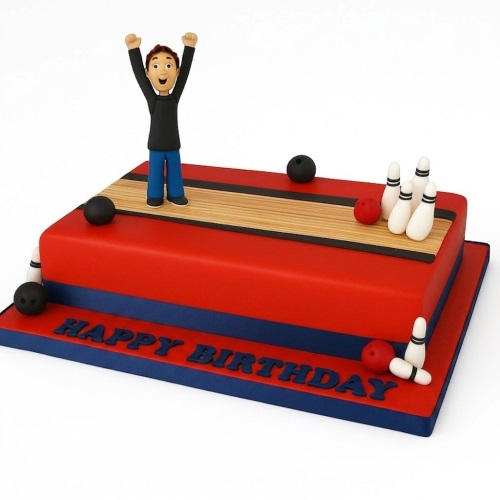 Rectangular red and blue bowling birthday cake with a celebratory male figure, pins, and bowling balls on a lane design.
