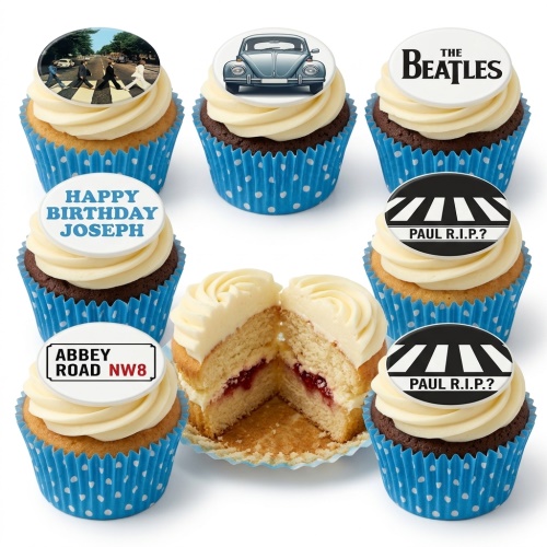 A set of Beatles Abbey Road themed birthday cupcakes with edible toppers and blue polka dot cases.