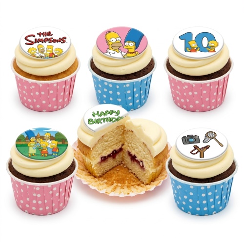 A selection of The Simpsons themed cupcakes with various character toppers, including Homer, Marge, Bart, Lisa, and a 'Happy Birthday' message, in pink and blue polka dot wrappers.
