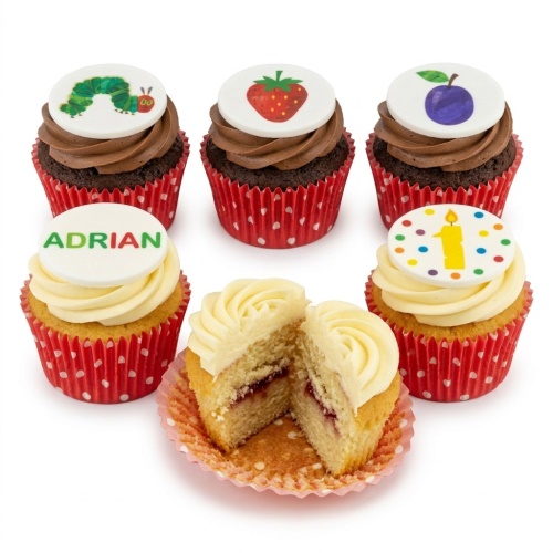A selection of Very Hungry Caterpillar themed cupcakes with fruit, a number 1 candle, and a personalised name topper.