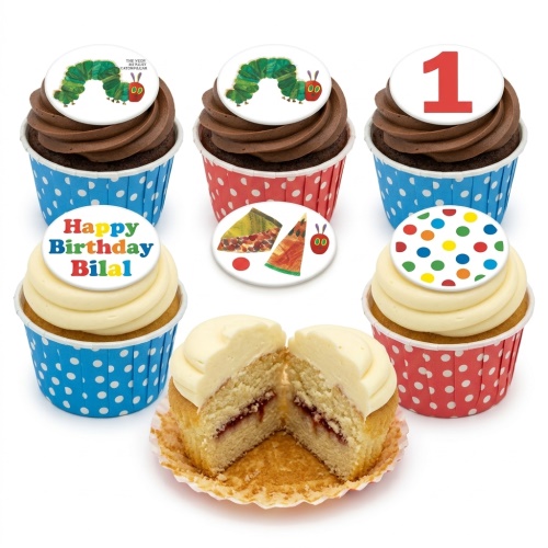 The Very Hungry Caterpillar themed cupcakes with chocolate and vanilla frosting, polka dot cases, and a red number one topper.