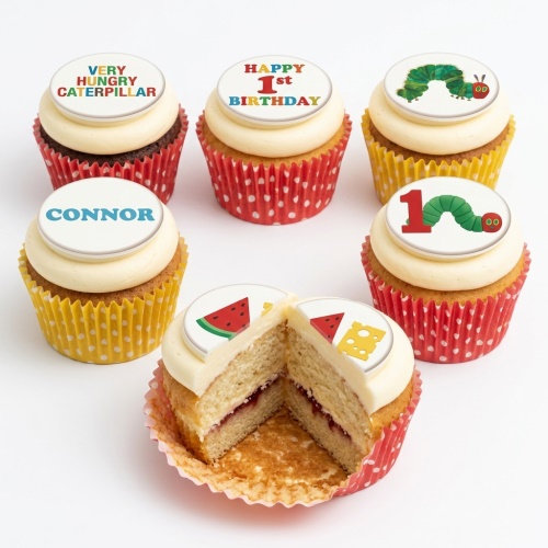 Set of The Very Hungry Caterpillar cupcakes with custom name and 1st birthday toppers.