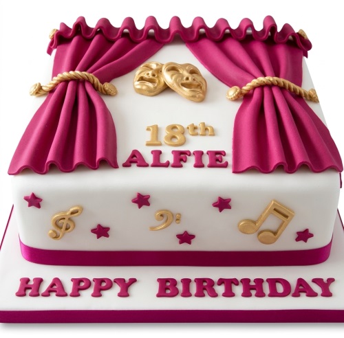 White square theatre theme birthday cake with magenta curtains, gold masks, musical notes, and custom age topper.