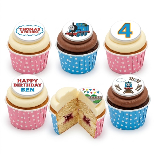 Selection of Thomas and Friends themed cupcakes with edible toppers, including Thomas the Tank Engine and a custom age number.