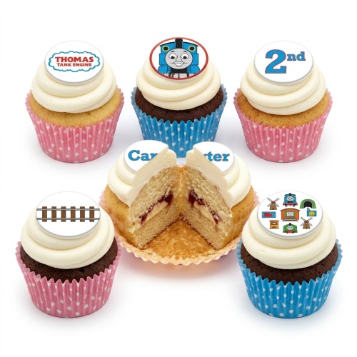 Thomas the Tank Engine themed cupcakes with white frosting, featuring train character, logo, tracks, and custom age and name toppers.