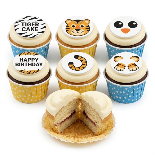 Set of tiger-themed birthday cupcakes with edible toppers, yellow and blue polka dot cases.