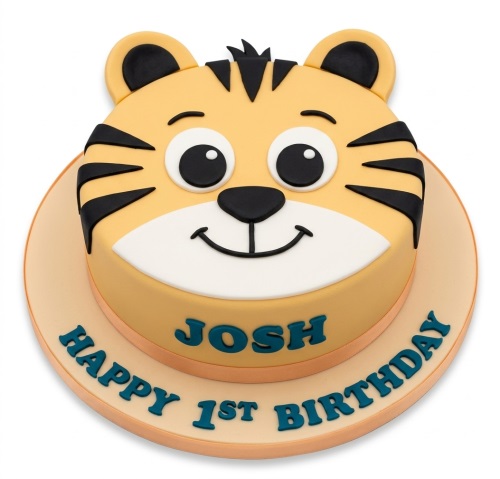 Round yellow and black tiger face birthday cake with a custom message board on the base.