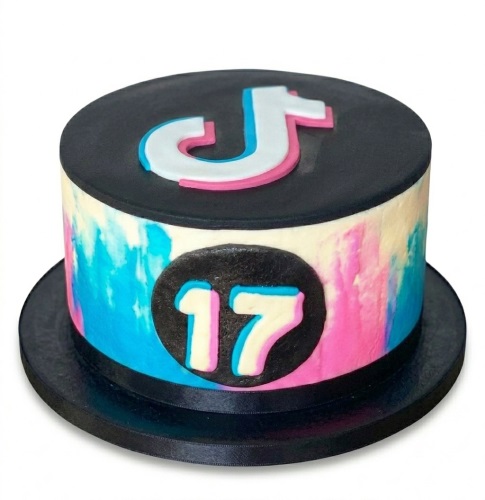 Round TikTok theme birthday cake with iconic logo and custom age plaque on a pink and blue watercolour background.
