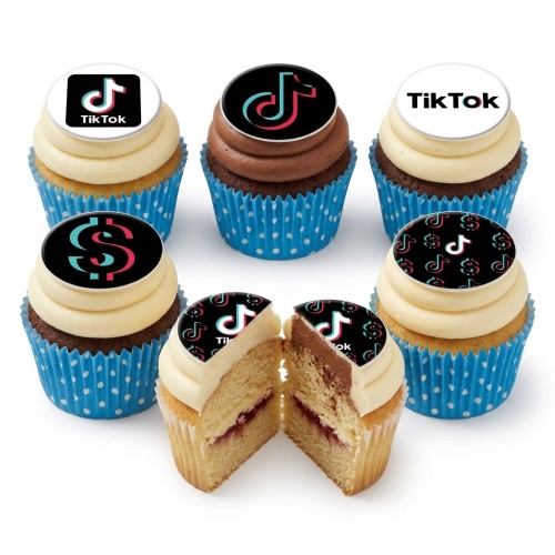 Six cupcakes with white and chocolate frosting, topped with various TikTok logos on edible discs, in blue polka dot cases.
