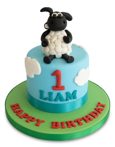 Shaun the Sheep themed birthday cake with a number 1 and personalised name.