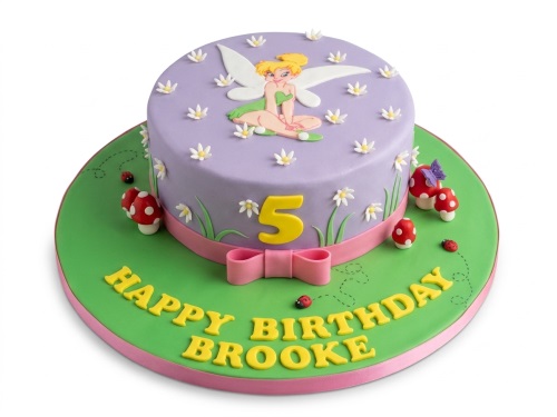 Round lavender Tinkerbell birthday cake with daisies, mushrooms, and a custom age topper.