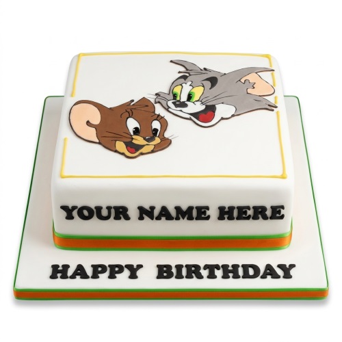 White square birthday cake featuring edible images of Tom and Jerry, with green and orange ribbons and space for a custom message.