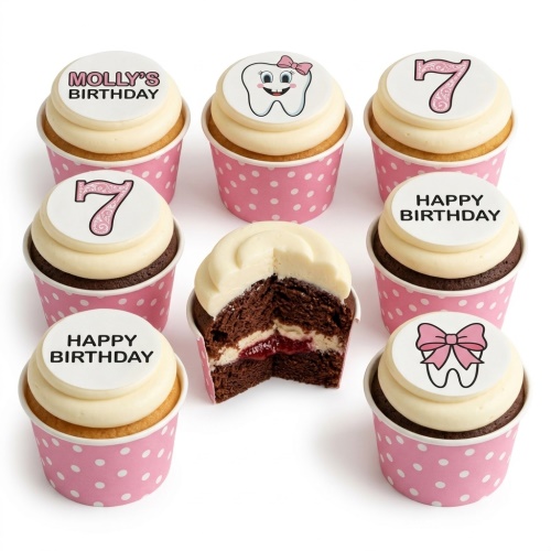 A set of cupcakes with white frosting and pink polka dot wrappers, featuring tooth characters, pink bows, custom age toppers, and "Happy Birthday" messages.
