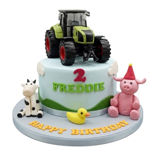 Single-tier farm birthday cake with a green tractor, cow, pig, and duck figurines.