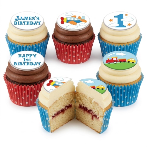 Cupcakes with edible toppers featuring aeroplanes, trains, and cars, suitable for a child's birthday.