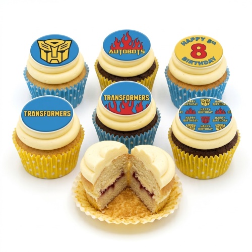 Transformers themed cupcakes with Autobots logo, flames, and custom 8th birthday topper.
