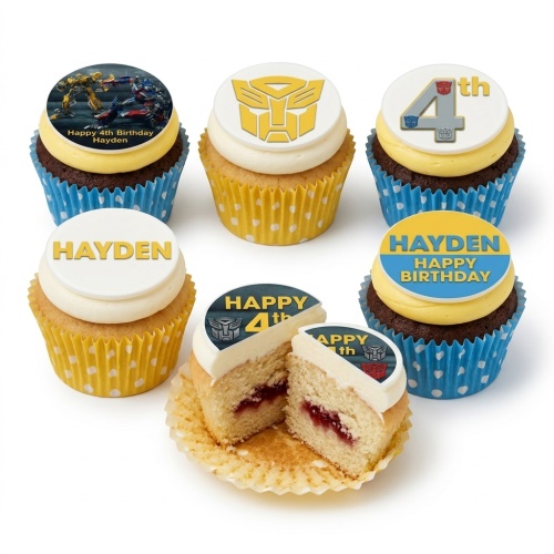 Transformers themed cupcakes with Autobot logo and custom age topper.