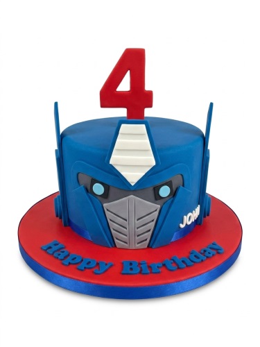 Blue and red Optimus Prime Transformers birthday cake with a red custom age topper and a personalised message.