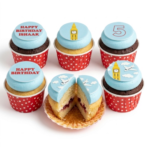 Assorted cupcakes with blue frosting, featuring Big Ben, airplanes, and custom birthday messages.