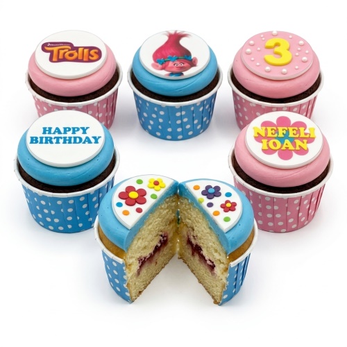 Set of Trolls themed birthday cupcakes with pink and blue frosting, custom age topper, and personalised name.
