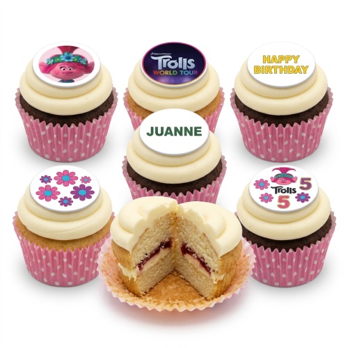 Six Trolls themed birthday cupcakes with white frosting, pink polka dot cases, and edible toppers featuring Poppy, Trolls World Tour logo, a 'Happy Birthday' message, a personalised name example, custom flower designs, and a custom age topper.