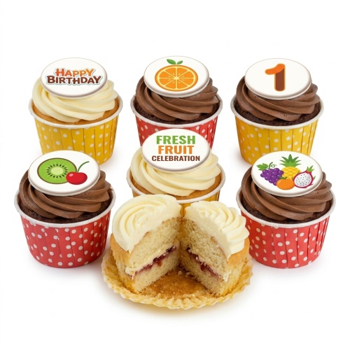 Assortment of fruity birthday cupcakes with custom age and message toppers, in red and yellow cases.