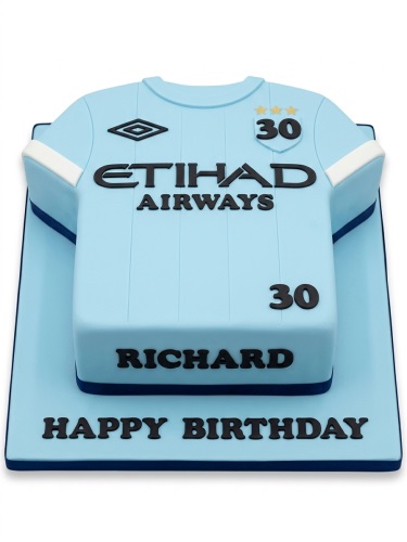 Light blue Manchester City football shirt birthday cake with custom name and age.