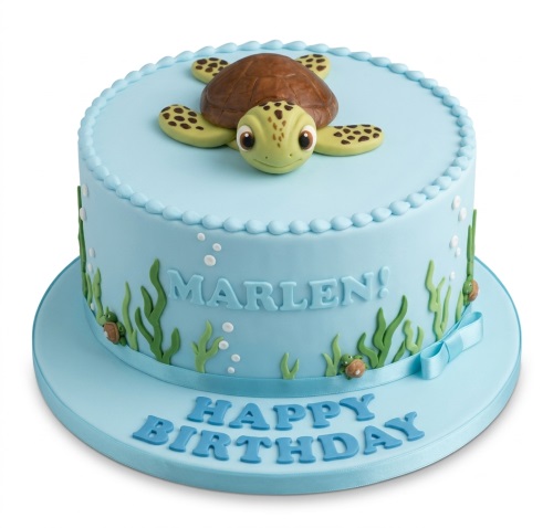 Light blue fondant birthday cake with a 3D turtle topper, seaweed, and bubbles, featuring a custom message.