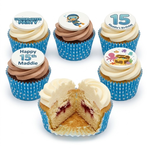 Underwater themed cupcakes with diver, octopus, and treasure chest toppers in blue wrappers.