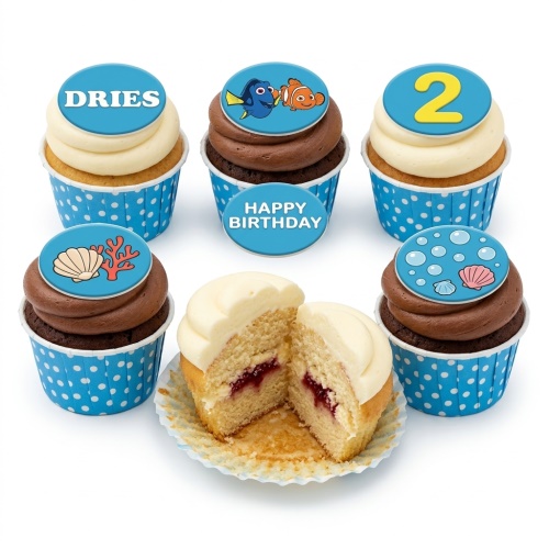 Under The Sea themed cupcakes with Dory and Nemo characters, seashells, coral, and custom age topper.