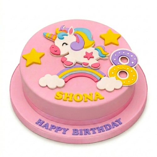 Pink unicorn birthday cake with rainbow, stars, and custom age topper for a girl's celebration.