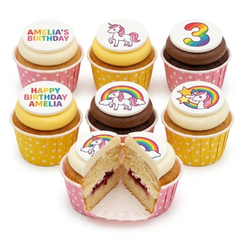 A selection of unicorn and rainbow themed birthday cupcakes with custom age and personalised message toppers.