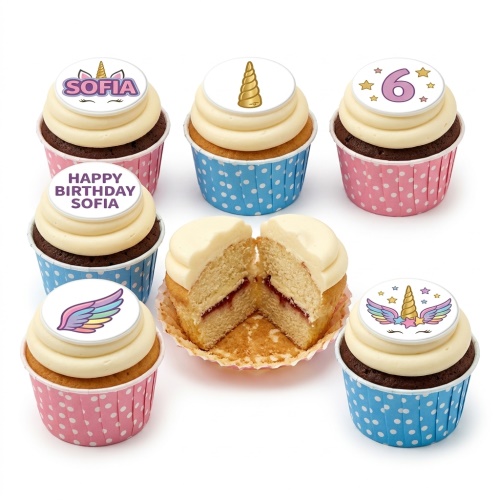 Unicorn birthday cupcakes with unicorn horn, unicorn face, rainbow wings, and custom age topper.