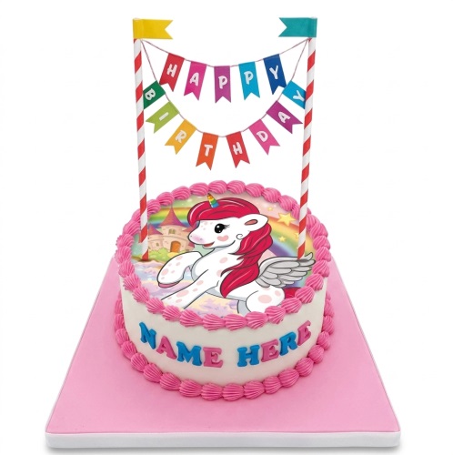 Round white birthday cake with a unicorn, rainbow, and castle edible image, pink piped frosting, and a "Happy Birthday" banner.