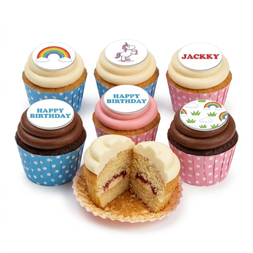 A selection of unicorn and rainbow themed birthday cupcakes with various frosting colours and polka dot wrappers.