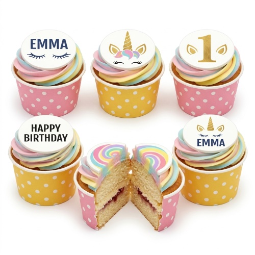 Pastel rainbow swirl cupcakes with unicorn and custom age toppers in polka dot cases.