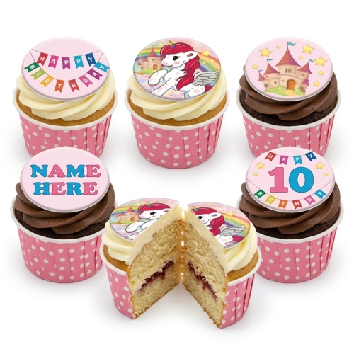 Unicorn and castle themed birthday cupcakes with custom name and age toppers, in pink polka dot wrappers.