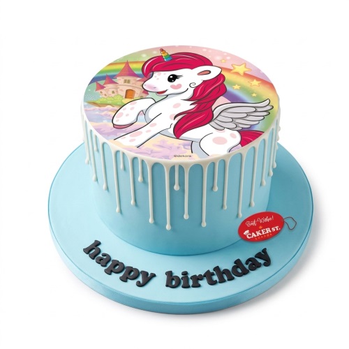 Round blue unicorn birthday cake with rainbow, castle, and white drip decoration.