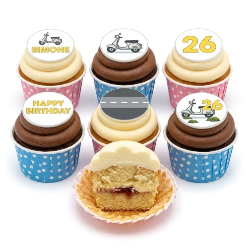 A set of six cupcakes with white and brown frosting, decorated with edible toppers featuring white scooters, a grey road, and examples of custom age "26" and name "SIMONE".