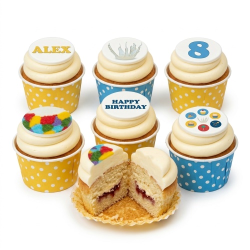 Vanilla cupcakes with cream frosting and customisable edible toppers for name, age, and messages.