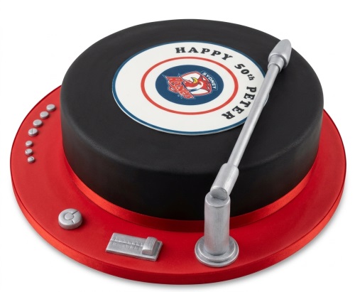 Round black record player birthday cake with silver tonearm and red base.
