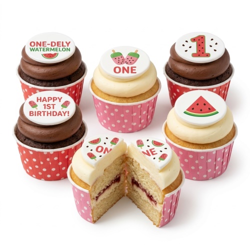 Watermelon themed 1st birthday cupcakes with "ONE" and "Happy 1st Birthday" toppers.