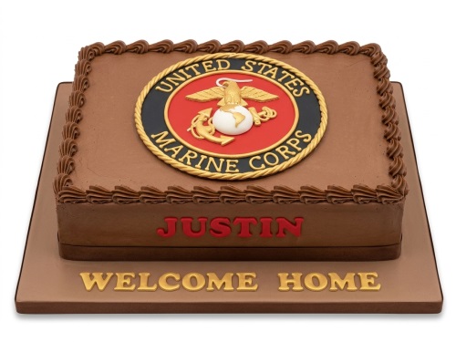 Rectangular chocolate cake with US Marine Corps emblem and 'Welcome Home' message.