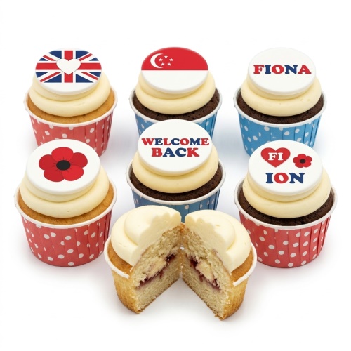 Six cupcakes with white frosting and edible toppers, including Union Jack, Singapore flag, poppy, and 'WELCOME BACK' message.