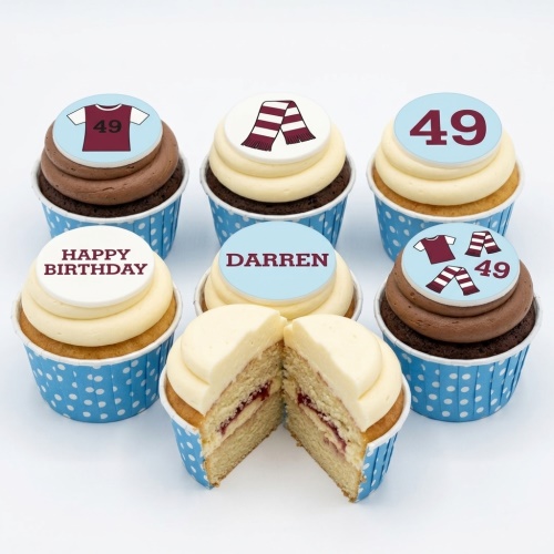 Football themed cupcakes with maroon and blue icing, featuring jersey, scarf, and custom age toppers.