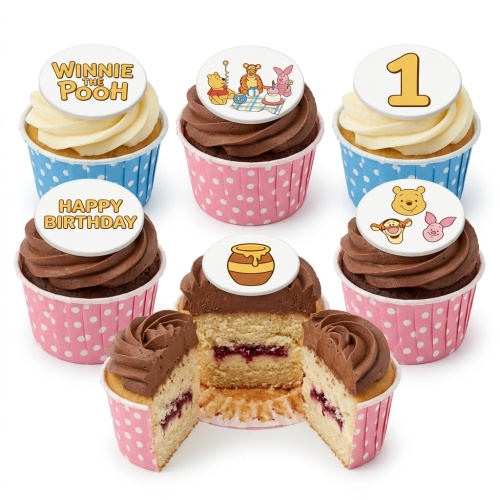 Winnie the Pooh themed cupcakes with character, honey pot, and custom age toppers in polka dot wrappers.