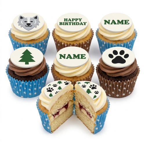 Wolf, tree, and paw print birthday cupcakes with personalised toppers and vanilla and chocolate sponges.