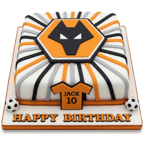 Square white, orange, black, and grey cake with Wolverhampton Wanderers football club logo and 'Happy Birthday' message.
